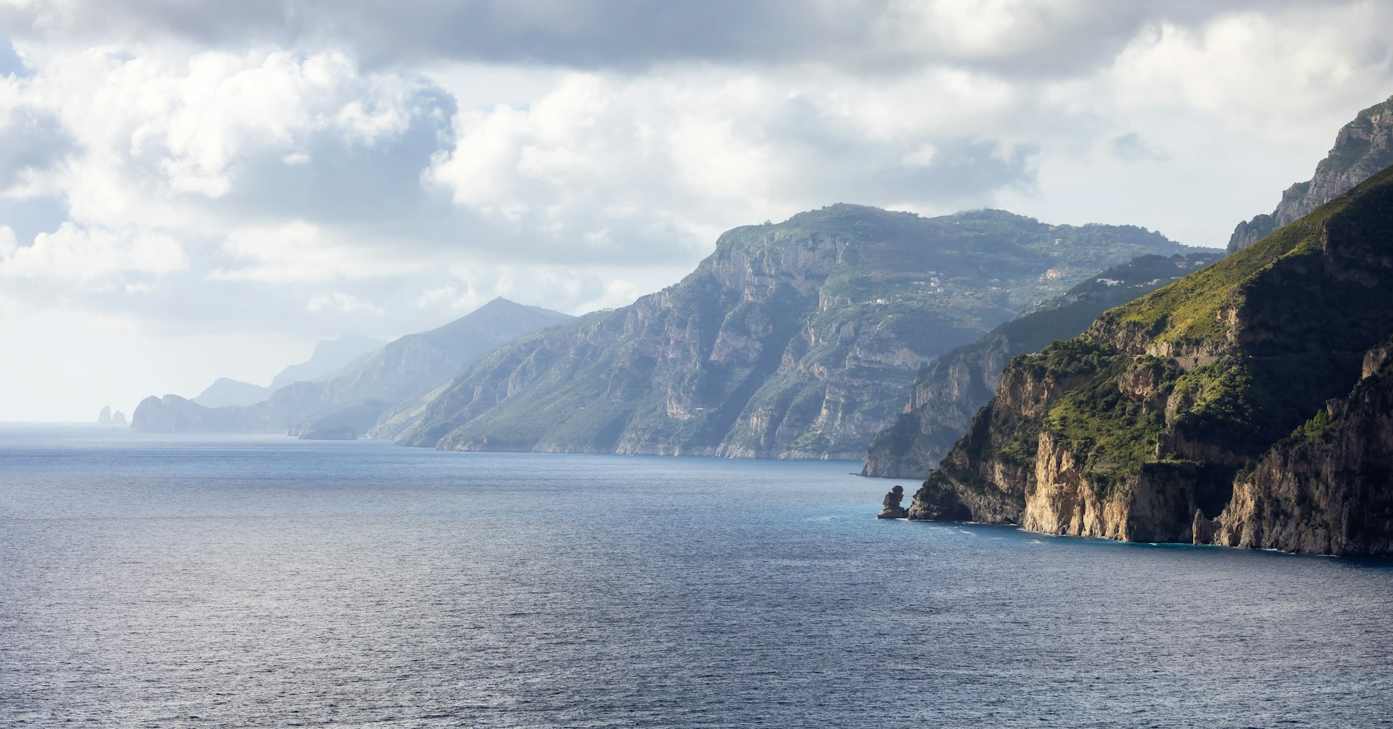 Rocky Cliffs and Mountain Landscape by the Tyrrhenian Sea. Amalfi Coast, Italy. Nature Background